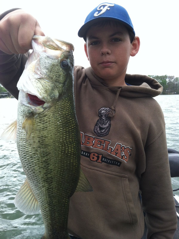 Robert with a Texas Bass caught on a red/chartreuse miniboss.