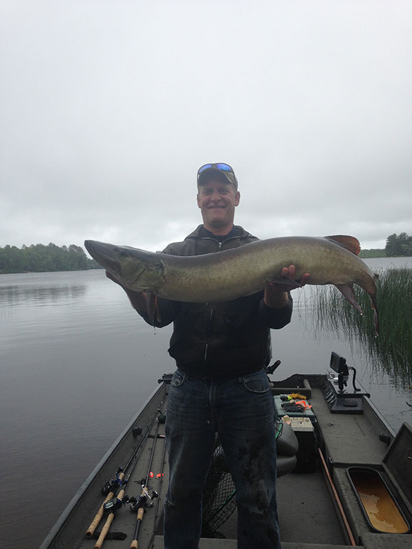 Mike A. with a 47.5 inch caught on the Boss!